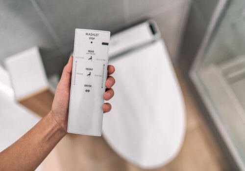 A smart toilet remote control for washing features